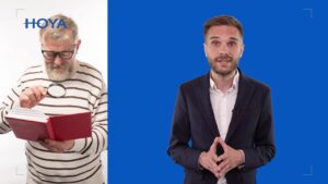 Mężczyzna z brodą czyta książkę z lupą, obok mężczyzna w garniturze na niebieskim tle, logotyp HOYA.